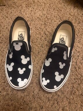 Vans Kids Slip-On Sneakers in Black with White Mickey Pattern